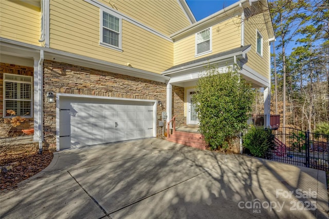 view of front of property with a garage