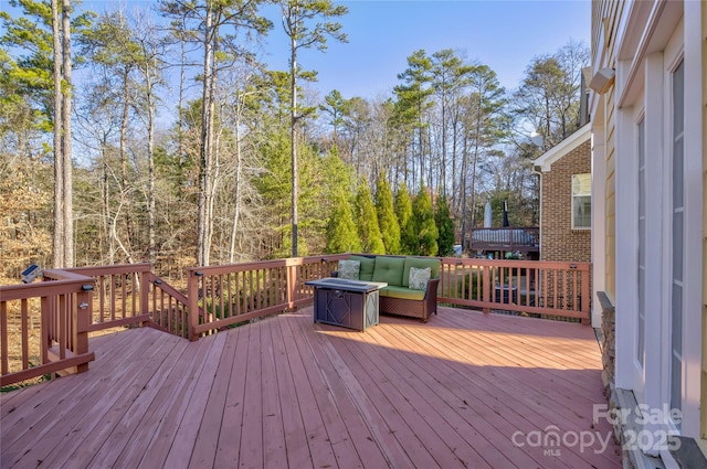 deck with outdoor lounge area