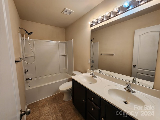 full bathroom with vanity, toilet, and bathing tub / shower combination