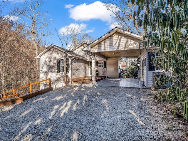 view of front of house with a carport