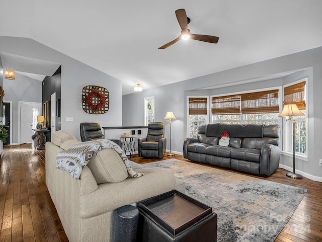 living room featuring dark wood-type flooring, ceiling fan, and lofted ceiling