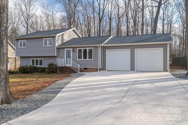 view of front of home with a garage