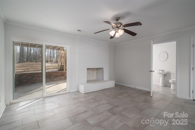 unfurnished living room with a brick fireplace, light tile patterned floors, crown molding, and ceiling fan