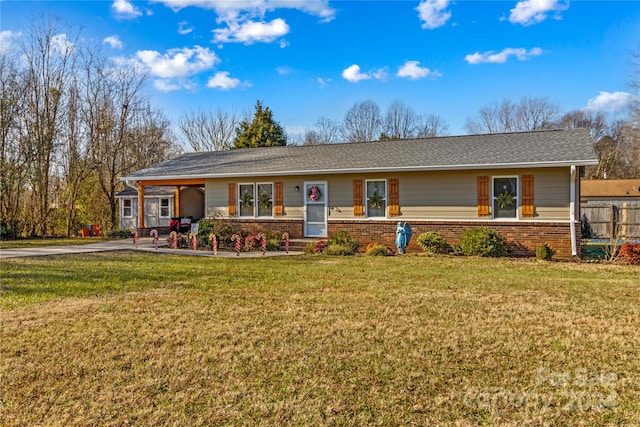 ranch-style house with a front yard