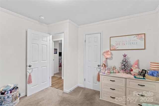 carpeted bedroom featuring ornamental molding