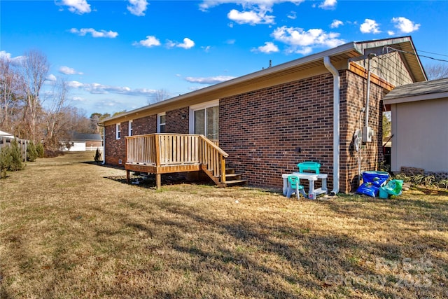 view of home's exterior featuring a yard