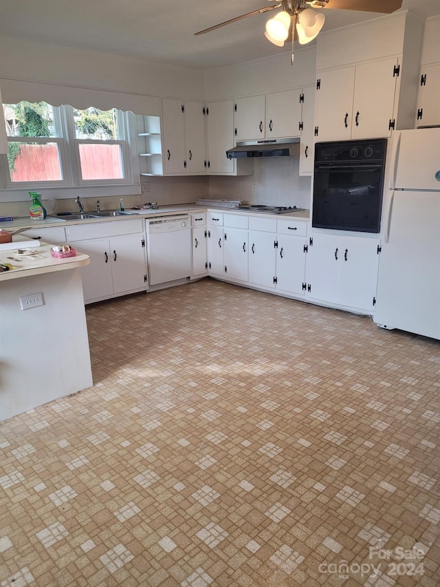 kitchen featuring white cabinets, white appliances, ceiling fan, and sink