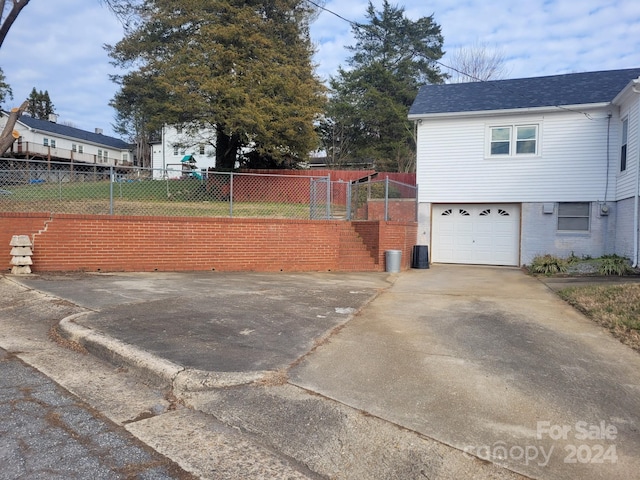 exterior space with a garage