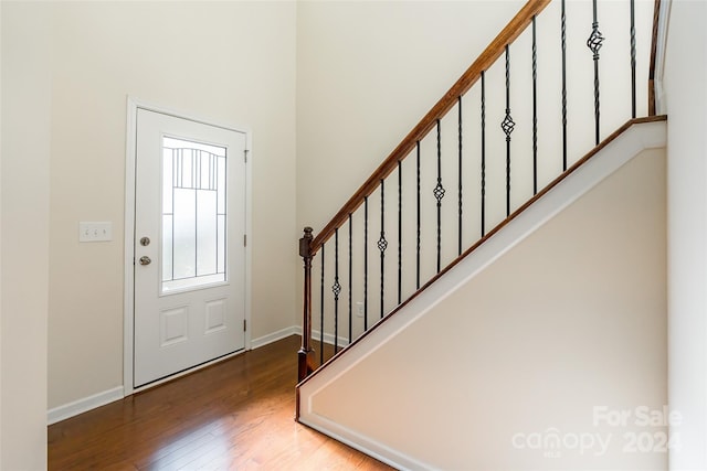 foyer entrance featuring hardwood / wood-style floors