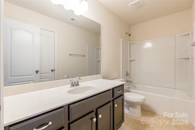 full bathroom featuring tile patterned floors, vanity, toilet, and washtub / shower combination