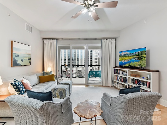 living room with ceiling fan