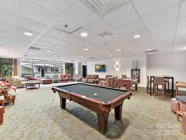 game room with floor to ceiling windows, a drop ceiling, carpet floors, and pool table