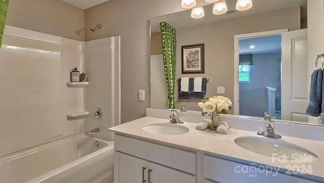 bathroom with vanity and shower / bath combo with shower curtain