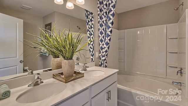 bathroom with vanity and tub / shower combination