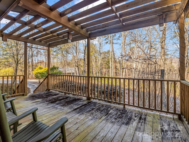 wooden terrace with a pergola