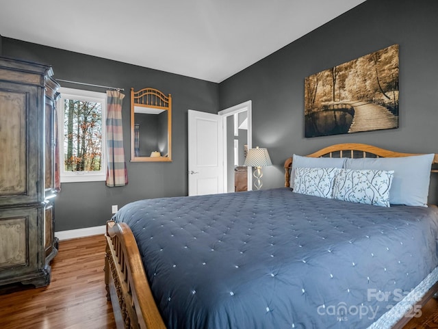 bedroom featuring hardwood / wood-style floors