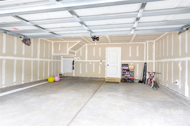 garage featuring a garage door opener