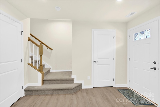 entrance foyer featuring light wood-type flooring