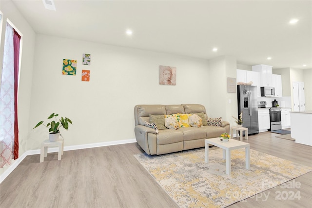 living room featuring light hardwood / wood-style flooring