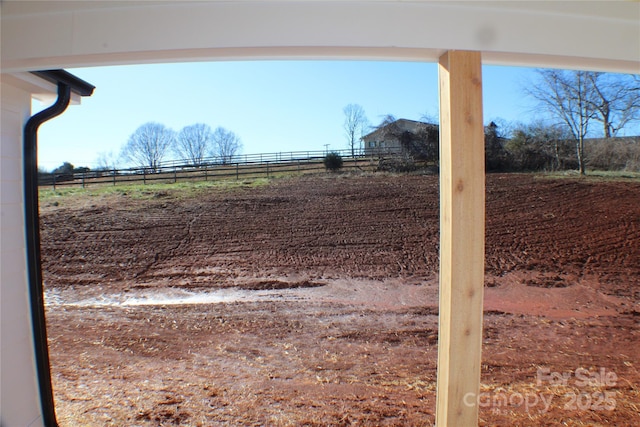 view of yard featuring a rural view