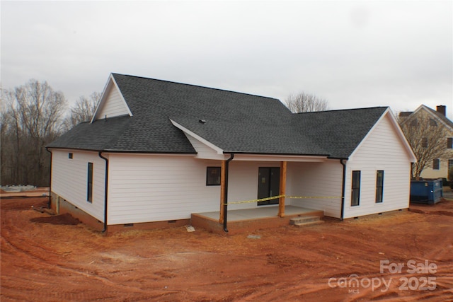 back of property with a patio area