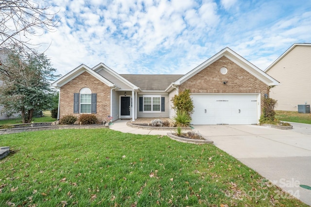 ranch-style home featuring central air condition unit, a front lawn, and a garage