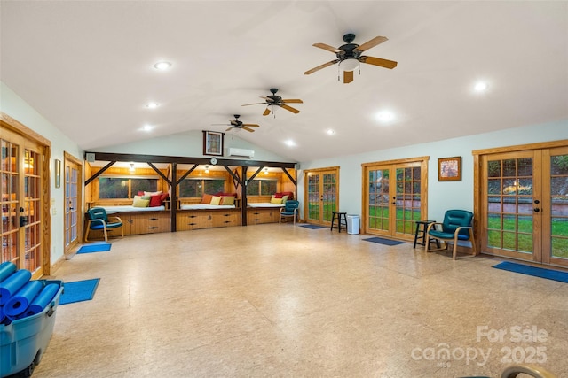 interior space featuring ceiling fan, lofted ceiling, and french doors