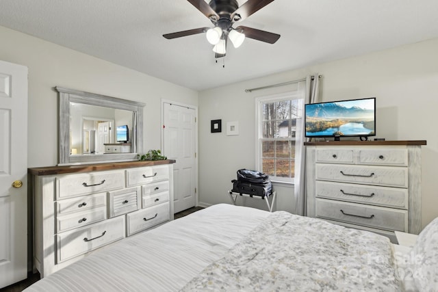 bedroom featuring ceiling fan