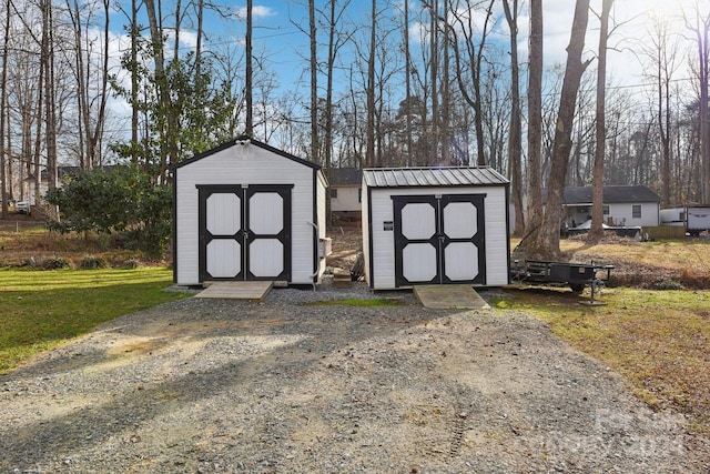 view of outbuilding featuring a lawn