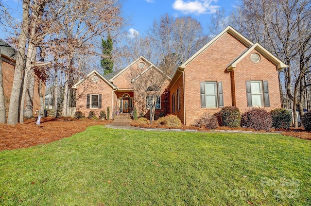 view of property featuring a front yard