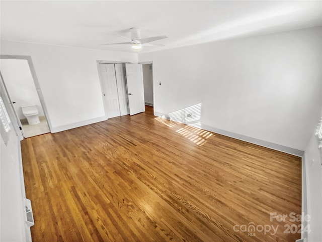 spare room featuring ceiling fan and wood-type flooring