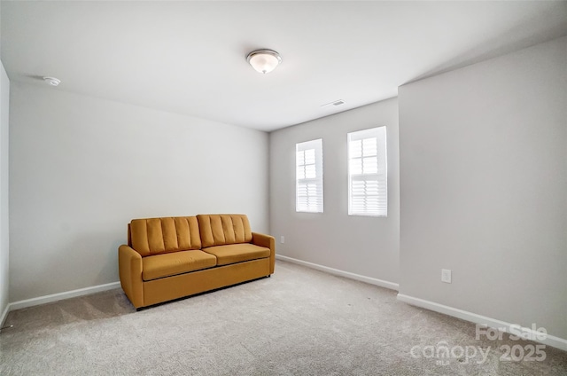 sitting room with carpet flooring