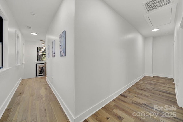 hallway featuring light hardwood / wood-style floors