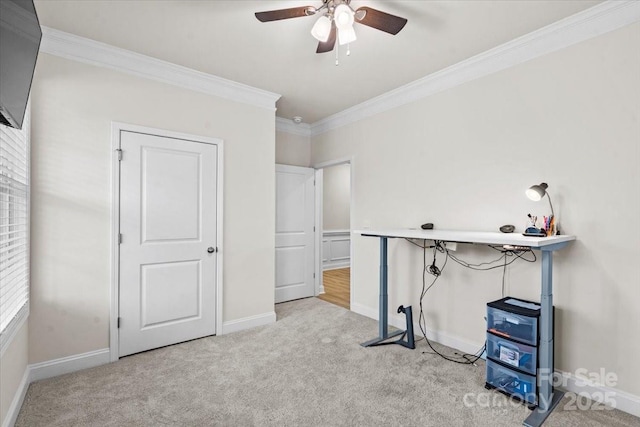 interior space with crown molding and ceiling fan