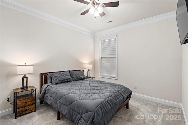 bedroom with ceiling fan, ornamental molding, and light carpet