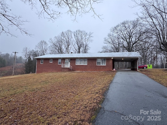 single story home with a carport