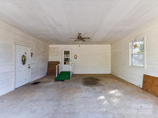 interior space with a ceiling fan