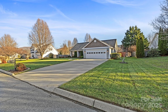 view of front facade with a front lawn and a garage