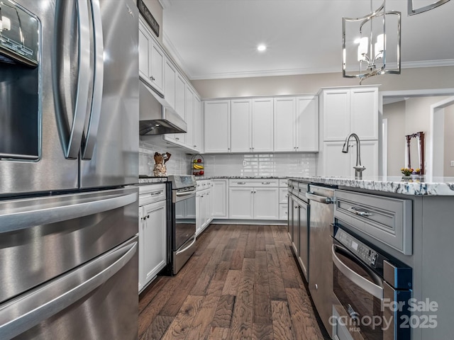 kitchen featuring light stone countertops, a chandelier, decorative light fixtures, white cabinets, and appliances with stainless steel finishes