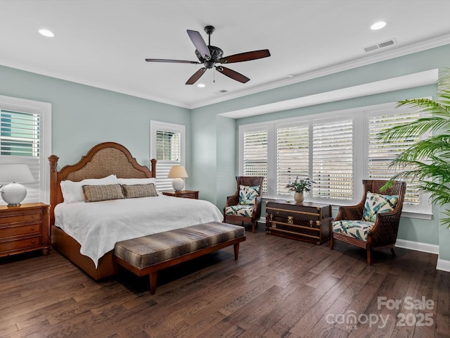 bedroom featuring ceiling fan, crown molding, and dark hardwood / wood-style floors