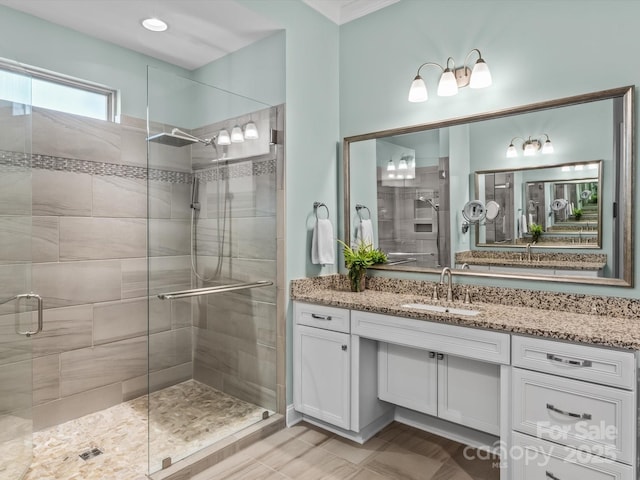 bathroom featuring vanity and walk in shower