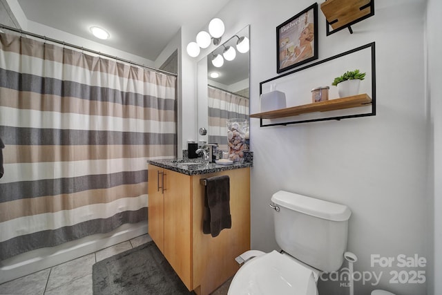 bathroom with curtained shower, tile patterned flooring, vanity, and toilet