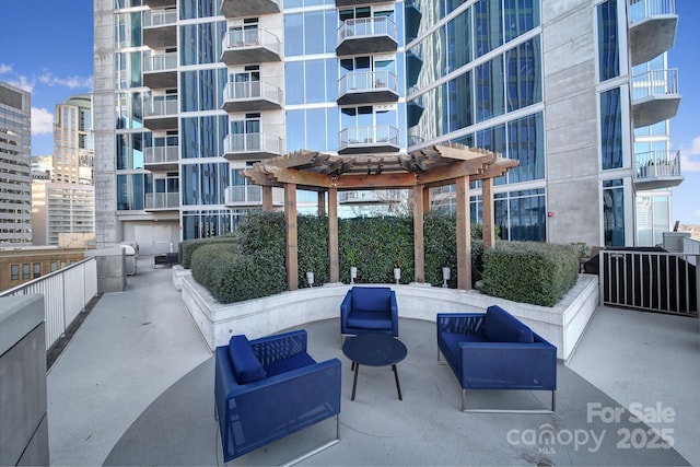 view of patio / terrace featuring a pergola