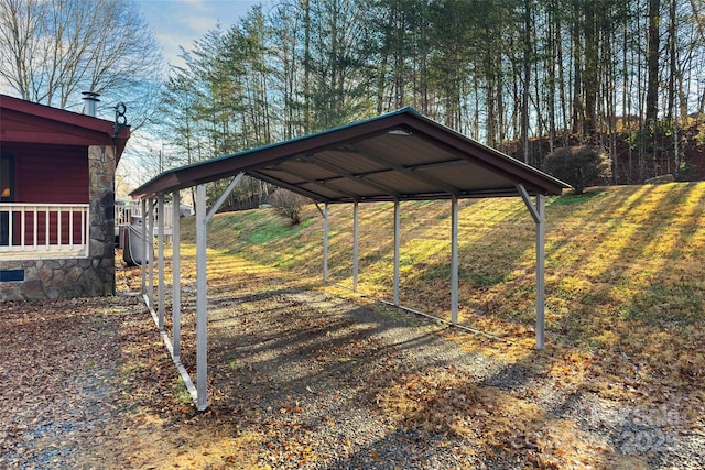 view of parking / parking lot with a carport