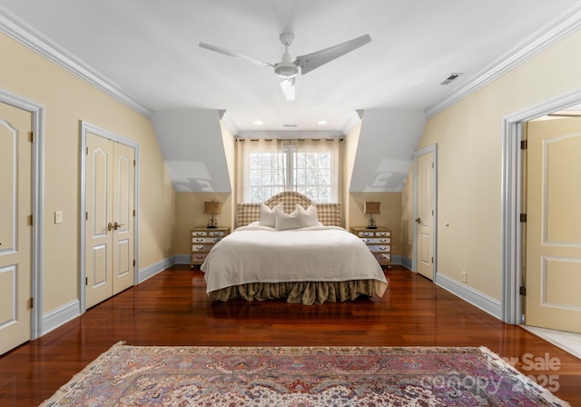 bedroom with ceiling fan, ornamental molding, and dark hardwood / wood-style floors