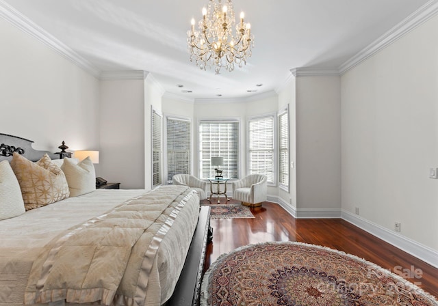 bedroom featuring dark wood-type flooring, crown molding, and a chandelier