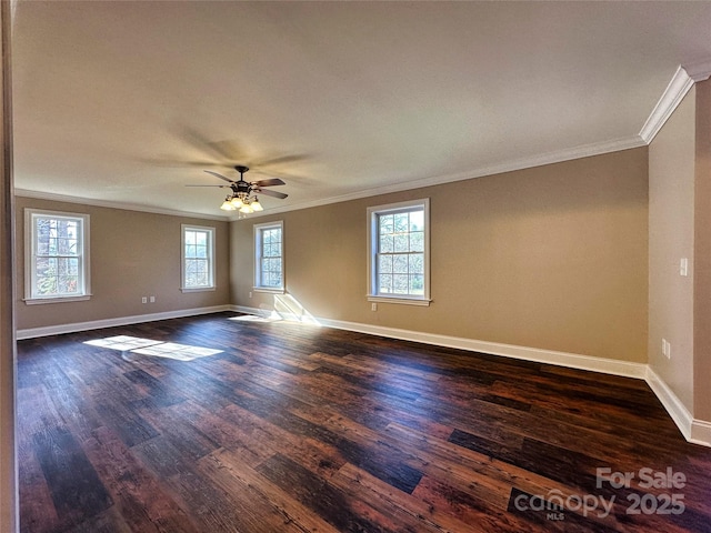 empty room with dark hardwood / wood-style floors, ceiling fan, and ornamental molding