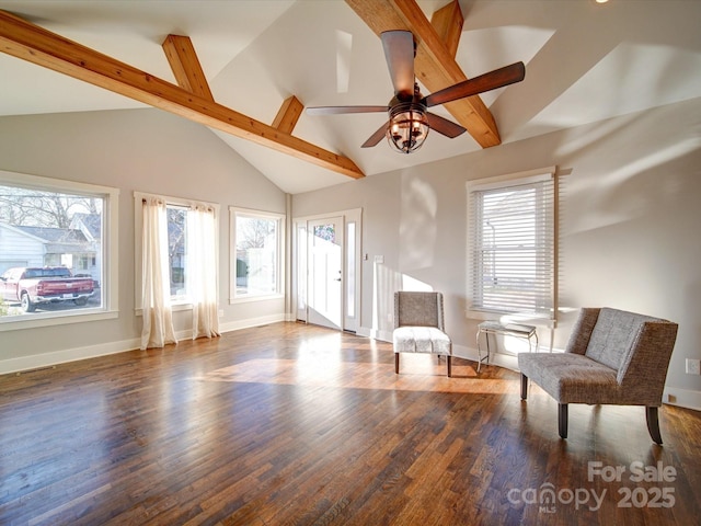 unfurnished room featuring lofted ceiling with beams, dark hardwood / wood-style floors, and ceiling fan