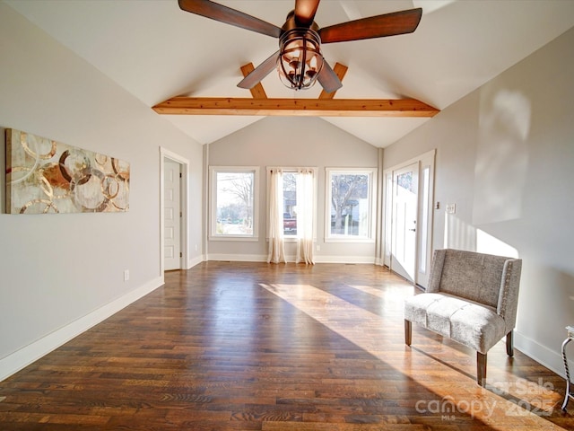 unfurnished room with lofted ceiling with beams, dark hardwood / wood-style floors, and ceiling fan