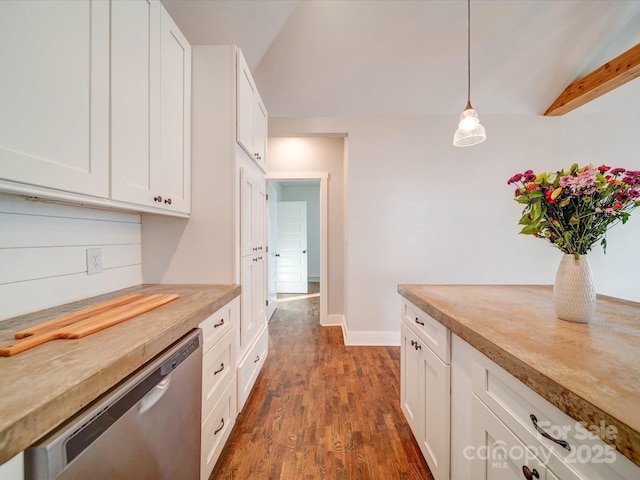 kitchen featuring lofted ceiling with beams, dishwasher, white cabinets, and pendant lighting